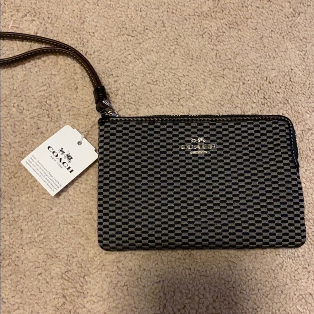 Coach wristlet with tags